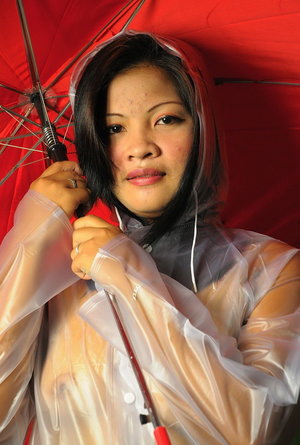 18 year old girl Megan Rain removes her sandals and then clothes to pose naked